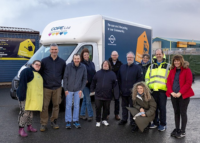 Heyleigh Wood, Steve Naulls, Martyn Bruce, Nikki Donaldson, Shaun Williamson, Steven Coutts, Derek Hart, Alison Moar, Osla Jamwal-Fraser, Malcolm Kelly and Kellie Naulls with the new Shetland Home Co van.